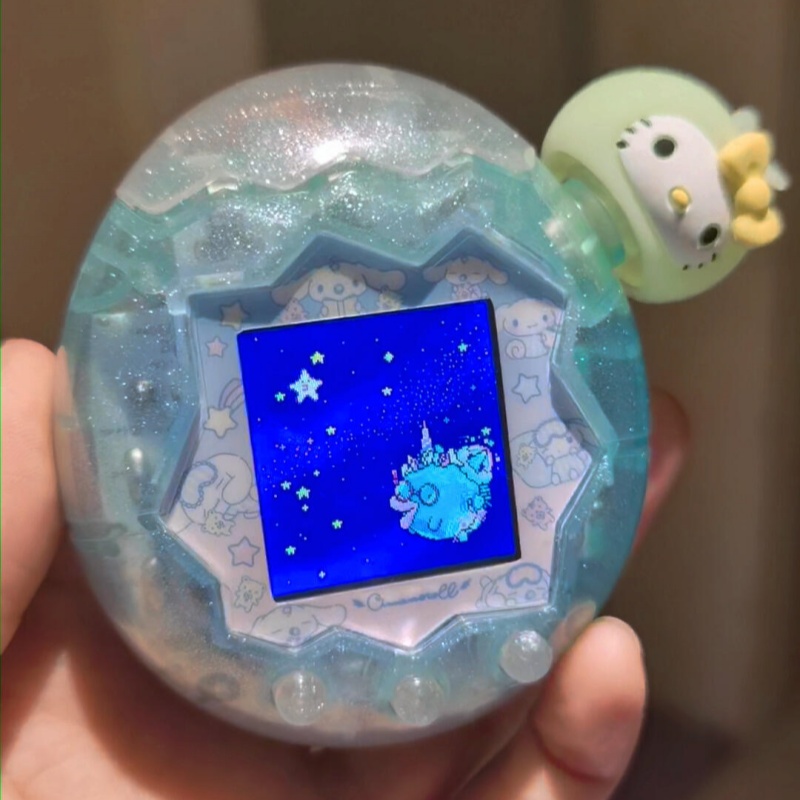 Bandai Model Tamagotchi - เคสใสกันกระแทกแบบมีสีสัน ประดับกลิตเตอร์เลเซอร์ สำหรับเครื่องเล่นเกมทามาก็อตจิ พาราไดซ์